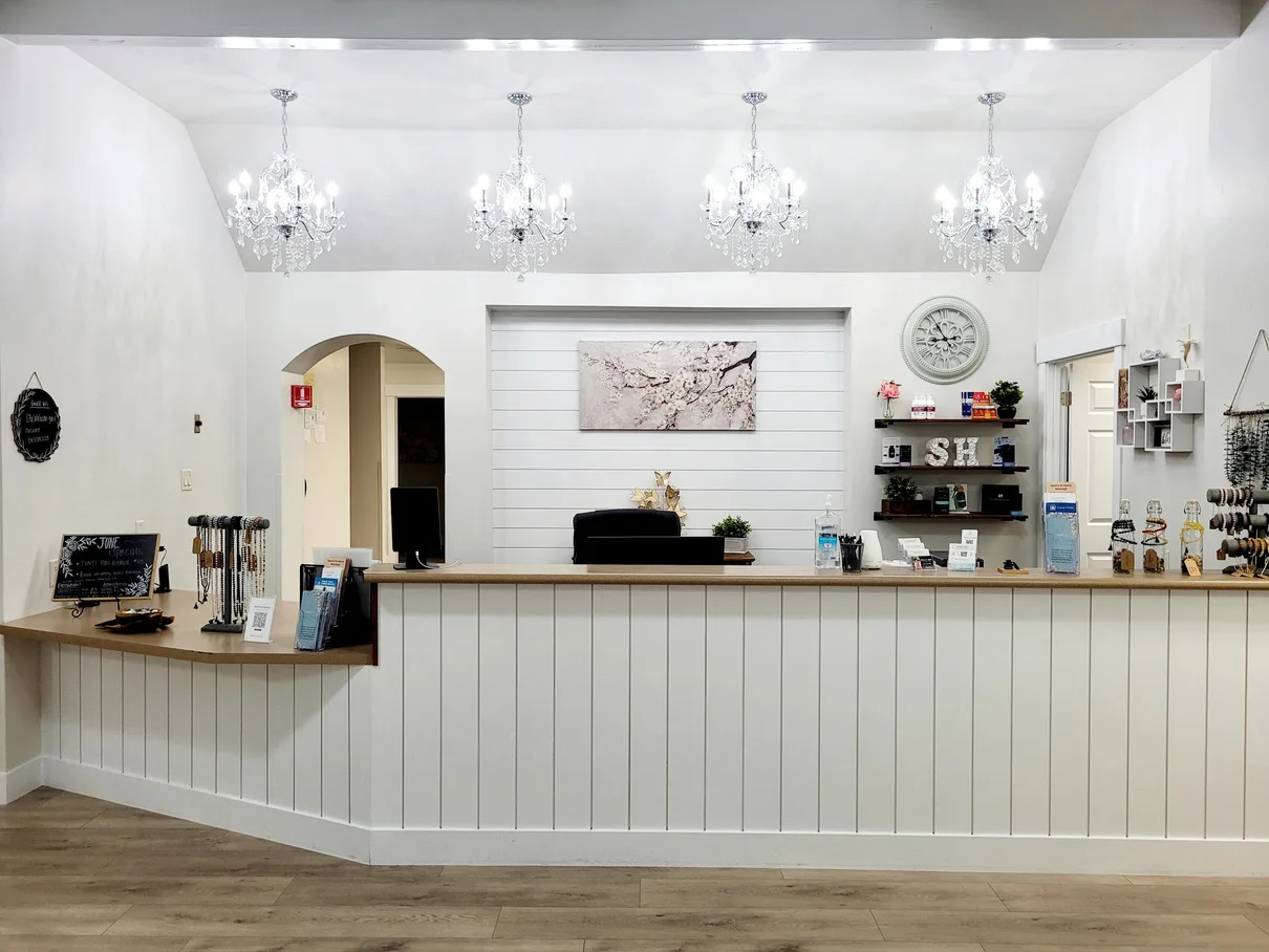 Safe Haven Spa front desk and lobby with crystal chandeliers in Springville, Utah