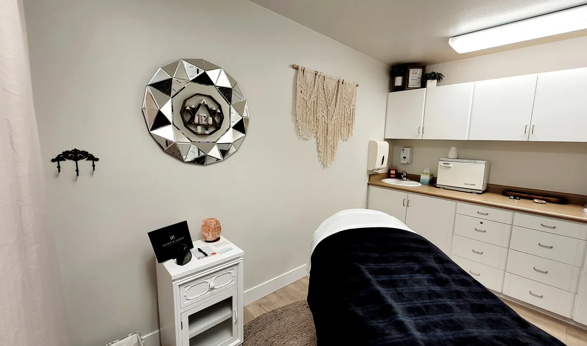 Private massage treatment room with macrame decor at Safe Haven Spa, Springville UT
