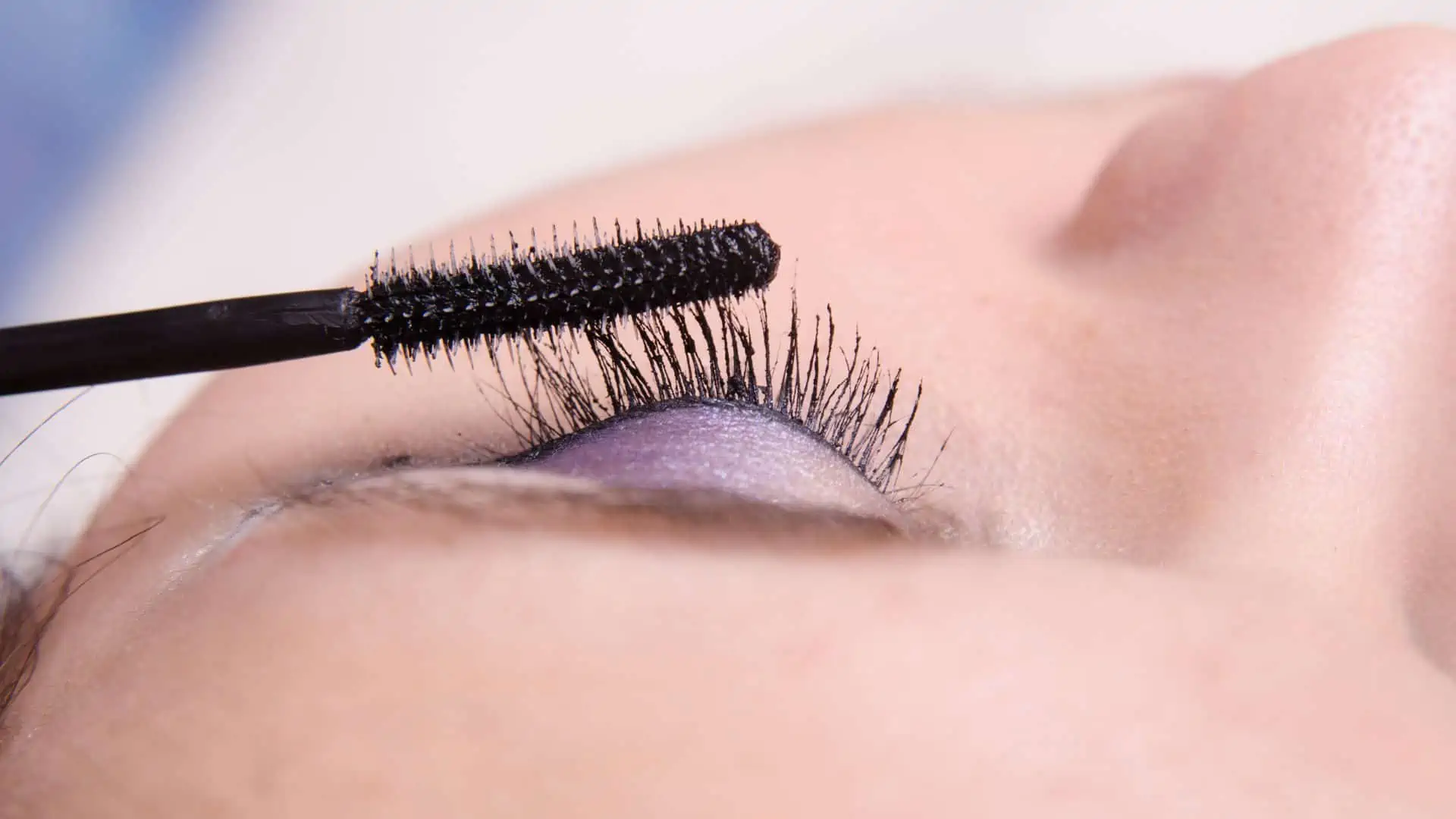 Lash tint result showing deeply colored natural lashes