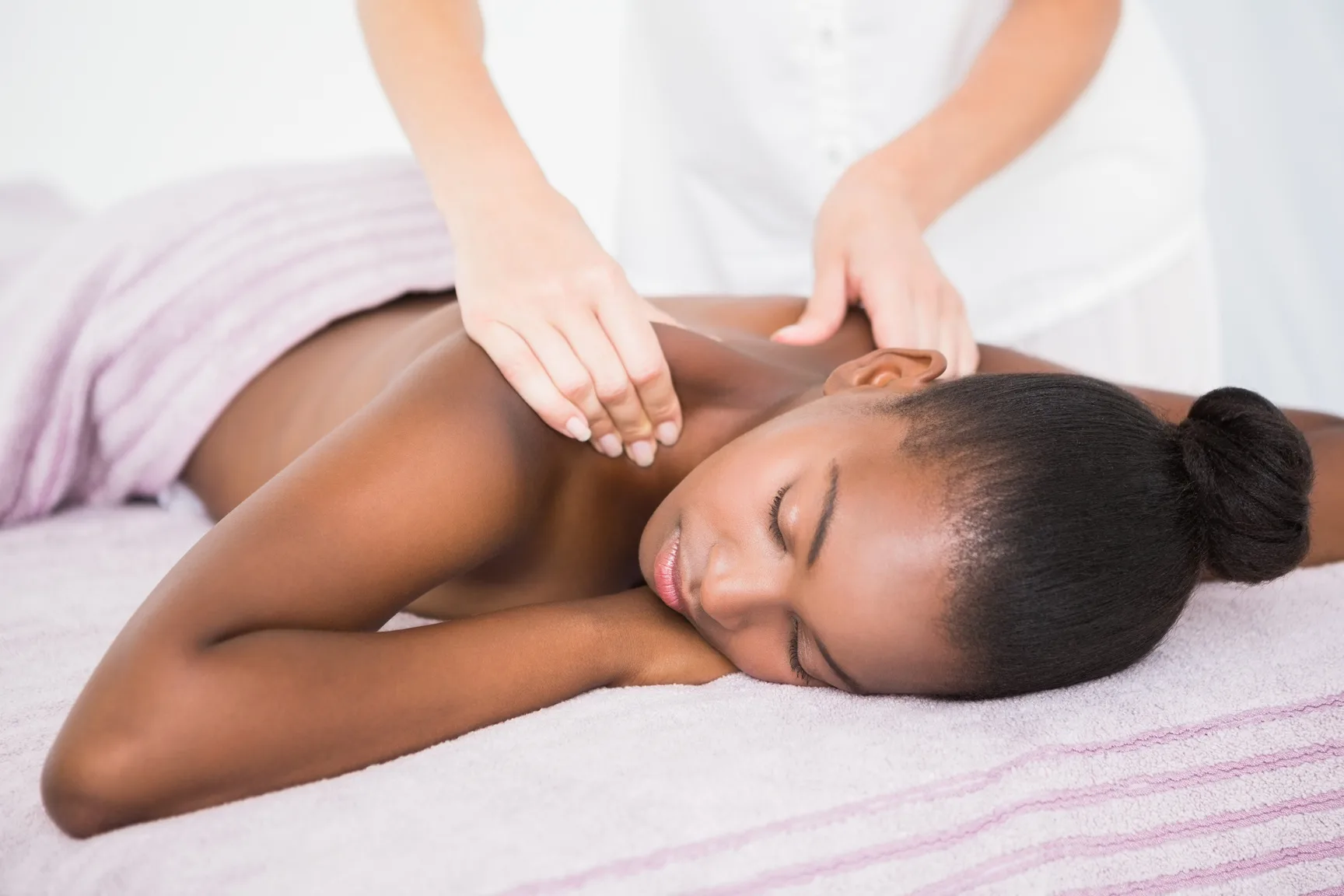 Deep tissue back massage targeting muscle tension at Safe Haven Spa in Springville, Utah