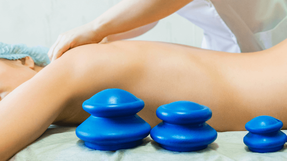 blue cupping massage with lady